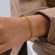Женский браслет из нержавеющей стали золотистый тонкий плоский 7040 фото 6