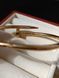 Cartier Браслет-гвоздь женский из медицинской стали золотистый с фианитами 7029 фото 3