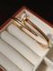 Cartier Браслет-гвоздь женский из медицинской стали золотистый с фианитами 7029 фото 2