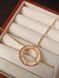 Cartier Кольє жіноче із медичної сталі золотисте з круглою підвіскою Love 8012 фото 3