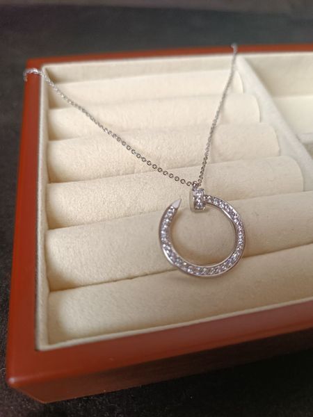 Cartier Колье женское из медицинской стали серебристое с подвеской-кольцом гвоздь 8013 фото