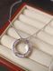Cartier Колье женское из медицинской стали серебристое с кулоном-кольцом и камнями 8009 фото 5