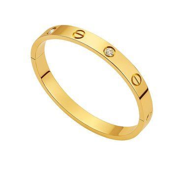 Браслет женский из медицинской стали золотистый с винтами и камнями Cartier 7002 фото