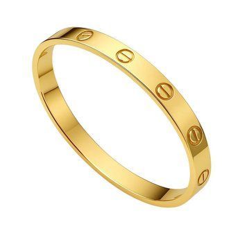 Браслет женский из медицинской стали золотистый с винтами Cartier 7003 фото